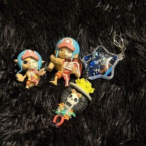 One Piece figures and book bag accessories
